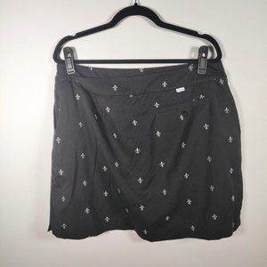 0001 IZOD black skort with grey fleur de lis